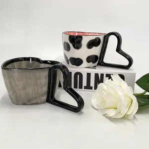 Nordic heart-shaped ceramic coffee mug set with ink texture and cow pattern design