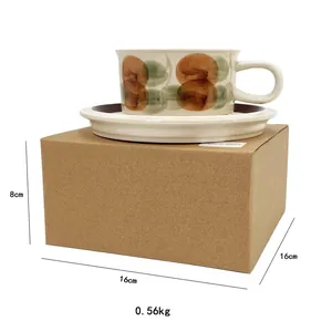 Detail of French vintage ceramic coffee cup set with watercolor dots and packaging