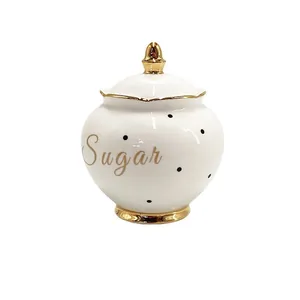 Nordic ceramic sugar bowl with gold rim and black dots, lidded storage jar for coffee