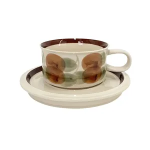 French vintage ceramic coffee cup and saucer set with hand-painted fruit pattern