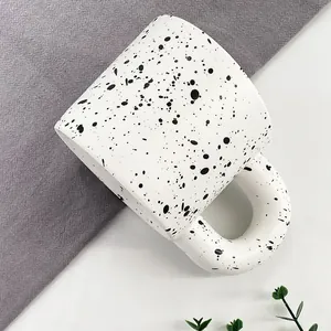 Minimalist ceramic splash ink coffee mug with thick handle and modern artistic pattern