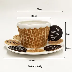 Macro detail of biscuit-shaped ceramic mug set showing 300ml capacity and cream icing rim