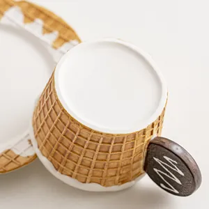 Macro view of waffle texture ceramic cup and cookie handle design with glazed finish