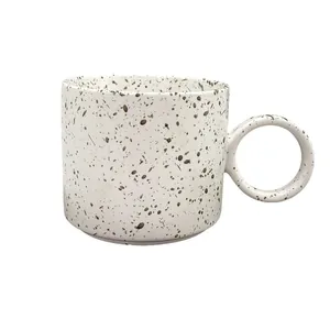 Ceramic splash ink coffee mug with unique large ring handle and white glaze finish