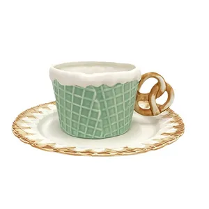 Ceramic pretzel handle coffee cup and mint green waffle saucer set for afternoon tea