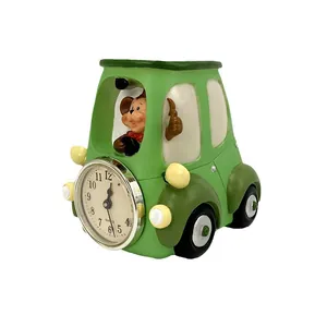 Reloj de mesa creativo con forma de coche de mono verde y portalápices decorativo