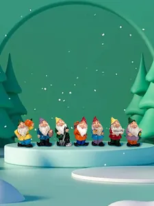 Detailed view of seven miniature garden gnomes figurines holding various gardening tools