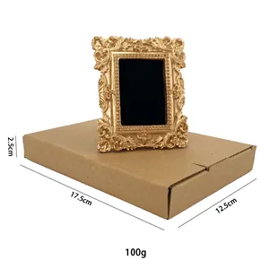 Détail du cadre baroque doré avec dimensions 17,5x12,5cm et motifs en résine gaufrée