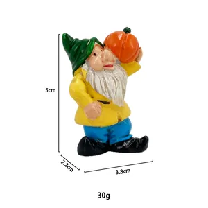 Detailed dimensions of miniature resin garden gnome carrying a pumpkin with 5cm height