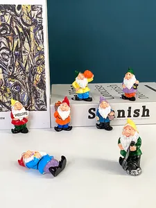 Close-up of 7 colorful resin garden gnomes set with vibrant hand-painted details