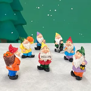 Set of 7 colorful resin garden gnome figurines with tools and a welcome sign for landscape