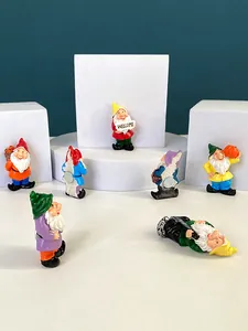 Detailed view of colorful 3D resin garden gnome fridge magnets with strong circular magnets