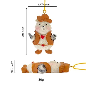 Detailed dimensions of the resin cowboy bear ornament with a yellow hanging cord