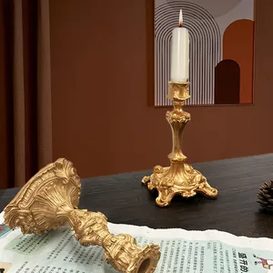 Vintage Baroque gold metal candle holder set with elegant floral engravings for home decor