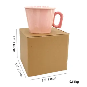 Pink ceramic bunny mug with mummy lid on cardboard box showing 15cm height dimensions
