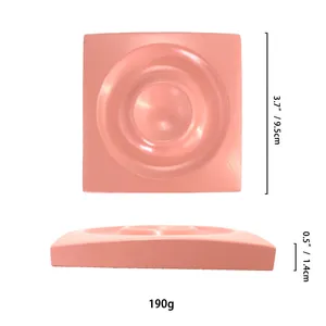 Detailed view of pink resin jewelry display tray with 9.5cm geometric stepped design