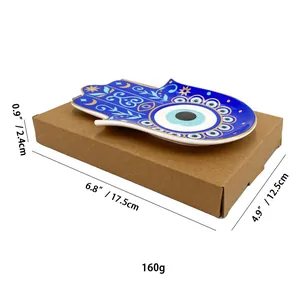 Nahaufnahme der blauen Hamsa-Hand-Keramikschale mit Evil Eye Mustern und Maßen