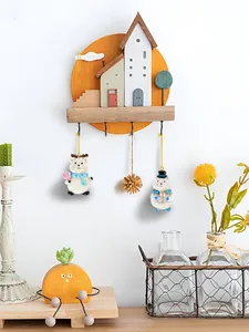 Detail of wooden house wall hook with cute polar bear ornaments and four metal hooks
