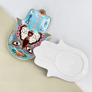 Hamsa-Hand Schmuckschale aus Keramik mit bunten Mustern in Vorder- und Rückansicht