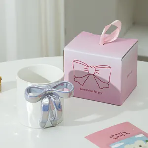 Tazza da caffè in ceramica con manico a fiocco blu iridescente e confezione regalo