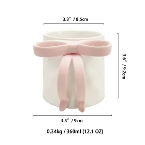 Detailed dimensions of white ceramic bow mug showing 360ml capacity and 3.6 inch height