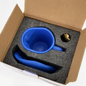 Blue matte ceramic coffee cup and tray set in secure protective foam packaging box