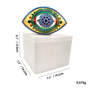 Detail view of colorful ceramic evil eye decor with gold edges and dimensions 19.2cm x 15.6cm