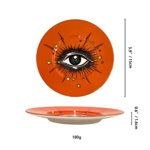 Plateau à bijoux en céramique orange avec bord doré et diamètre de 15 cm