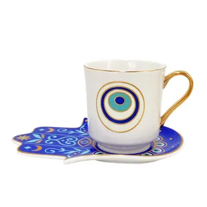 Set tazzina caffè in ceramica malocchio con piattino mano di Fatima e oro