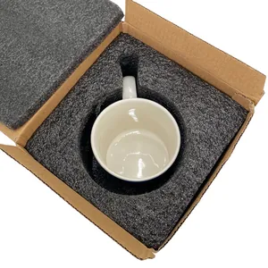 Detailed view of the shockproof foam packaging for a ceramic mug in a shipping box
