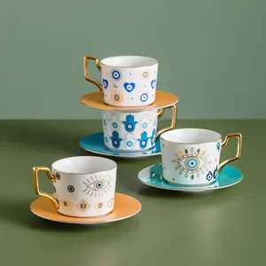 Set tazzine da caffè in ceramica con motivi Occhio di Allah e Mano di Fatima blu e oro