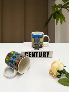Detailed close-up of ceramic mugs featuring vintage Italian architectural illustrations