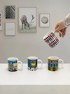 Detailed view of four ceramic mugs with vintage Italian architectural and royal guard prints