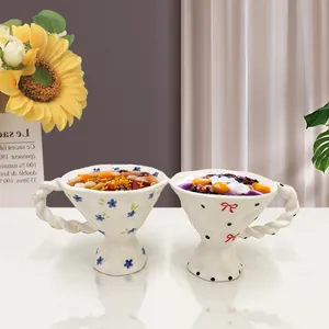 French vintage hand-painted floral ceramic goblet mugs with irregular wavy edges