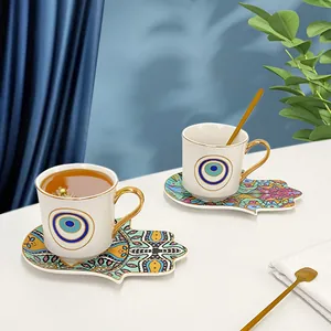 Set tazzine da caffè in ceramica nordica con occhio turco e manico dorato