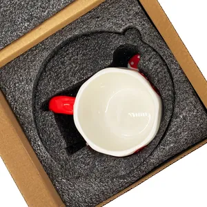 Ceramic mushroom coffee mug securely packed in shockproof foam inside a cardboard box