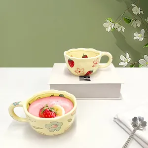 Handmade ceramic strawberry coffee mug with a scalloped edge and floral hand-painted pattern