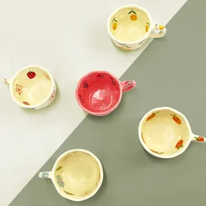 Creative handmade ceramic mugs set with hand-painted strawberry and fruit patterns