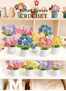 Collection of handmade crochet potted flowers in colorful yarn on a wooden display stand