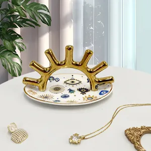 Bandeja para joyas de cerámica con ojo turco y soporte dorado para anillos y hogar