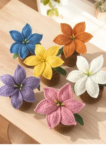Set of six colorful handmade crochet potted flowers with detailed knitting textures