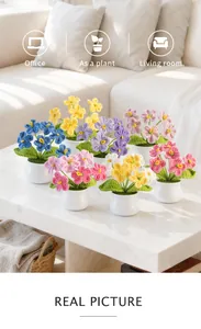 Set of six handmade crochet forget-me-not flower pots for cozy home office decoration