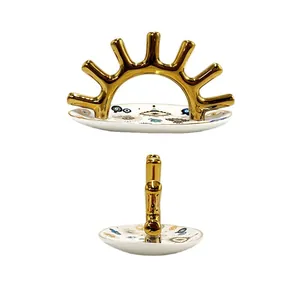 Bandeja de cerámica ojo turco con soporte de metal dorado para anillos y decoración
