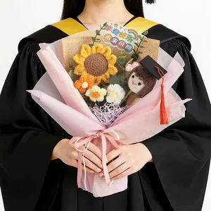 Crochet sunflower graduation bouquet with a cute doctoral doll and pink wrapping