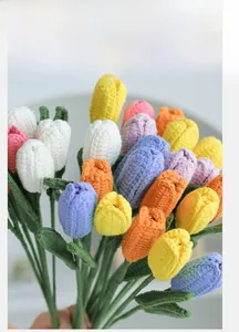 Detailed close-up of handmade crochet tulip bouquet showing colorful yarn knit textures