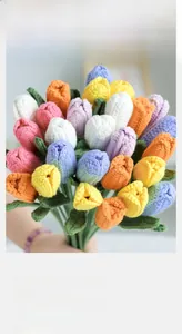 Detailed close-up of handmade crochet tulip bouquet in vibrant mixed colors