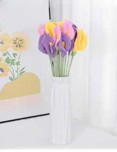 Handmade crochet calla lily bouquet in a white ceramic vase for home office decor