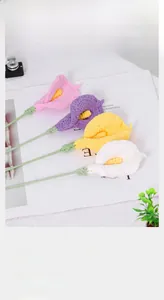 Detail of colorful handmade crochet calla lily bouquet for home and office desk decoration