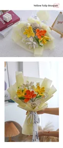 Detail of hand-knitted yellow tulips bouquet with Just for you ribbon and gift wrapping