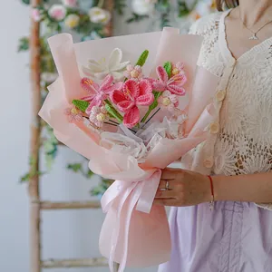 Handmade crochet tulip bouquet in pink wrapping paper with a Just For You ribbon